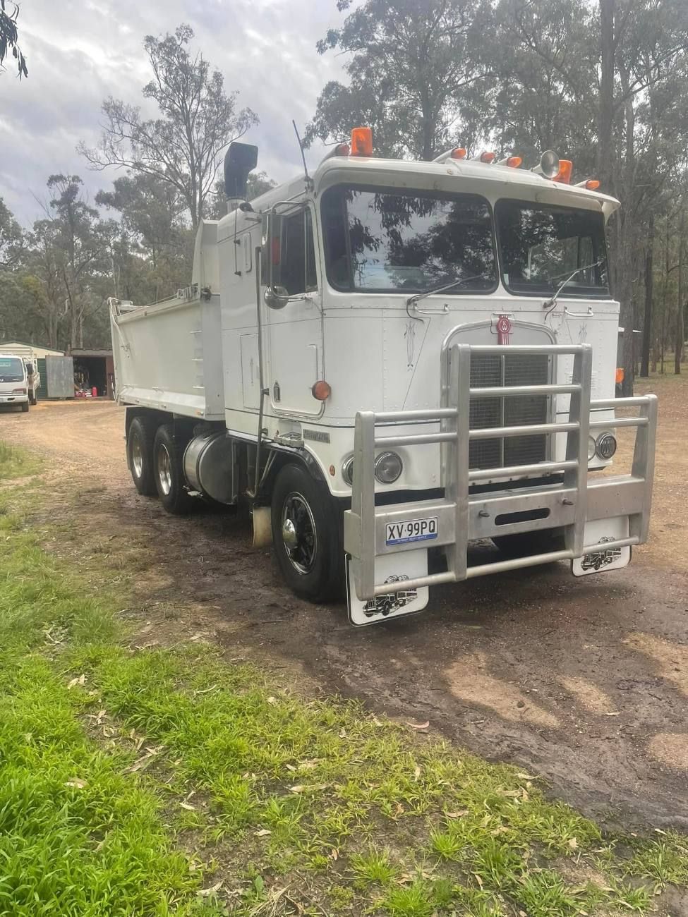 Earth-Crete's white tipper truck on a job site